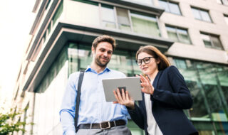 Colleagues Using Tablet_People At Work