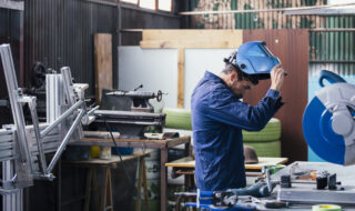 Side view of man wearing protective mask
