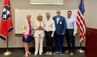 NFIB member Connie Vaughan of McKee Foods, Rep. Patsy Hazlewood, NFIB member Hugh Morrow, Jr. of Ruby Falls, NFIB State Director Jim Brown, and NFIB member Brian Hunt of Southern Champion Tray