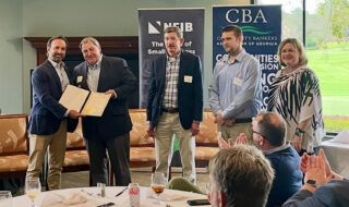 NFIB State Director Hunter Loggins, Citizens Community Bank President and CEO Jeff Hanson, CFO Jim Doyle, AVP Jonathan Tanner and Lori Godfrey, CBA’s executive vice president and chief of staff.