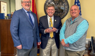 NFIB State Director Jim Brown, Sen. Paul Rose, NFIB Leadership Council member Casin Swann.