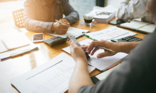 Co-workers are consultants on business documents, tax, transactions and business combinations after a bankrupt merger with a newly founded company.