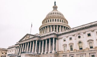 US Capitol in snowfall. United States Capitol building.